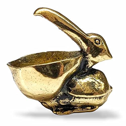 Brass pelican sculpture figurine on desk display
