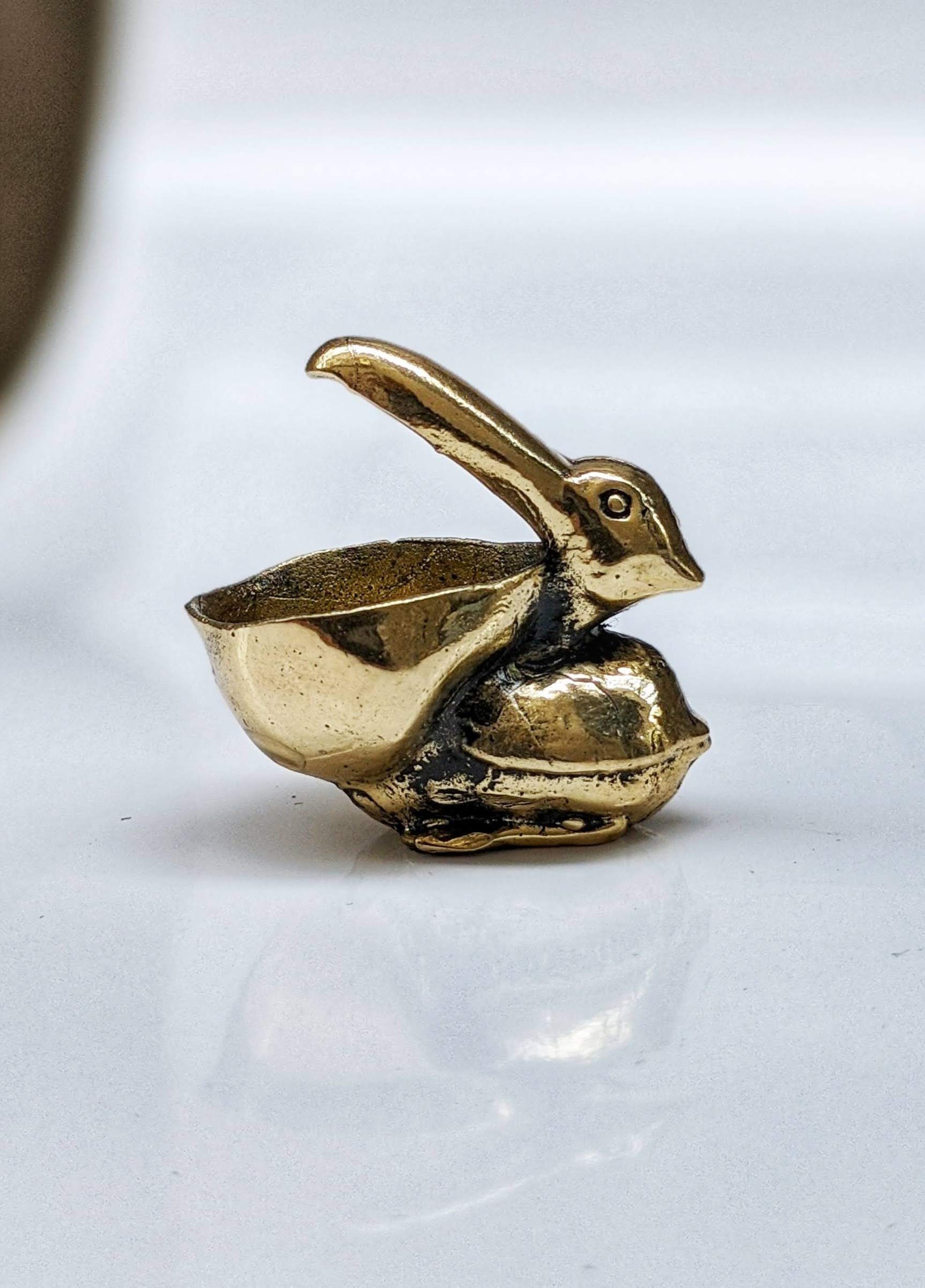 Brass pelican sculpture for home and office decor