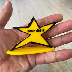 Bright yellow meme trophy with bold black lettering