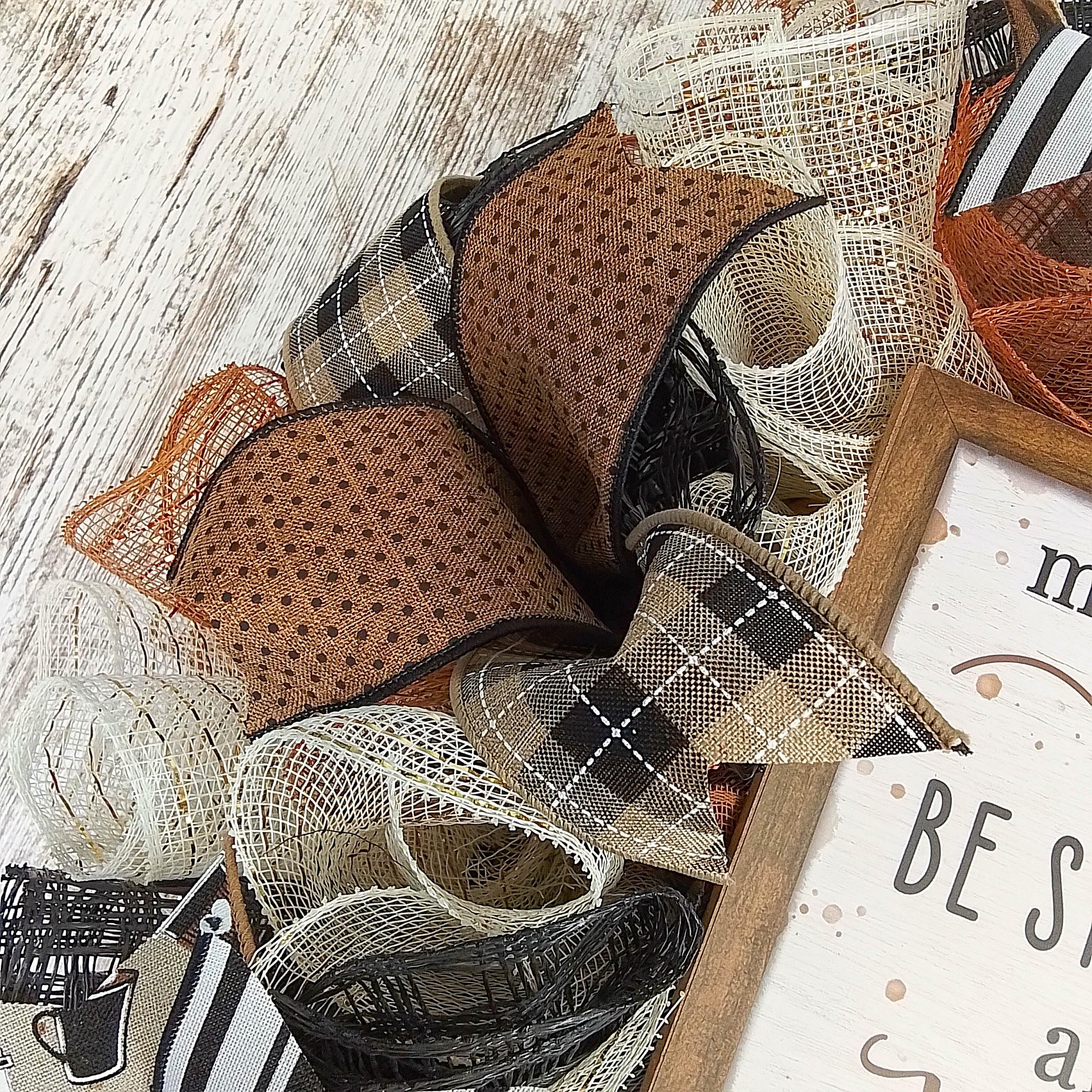 Wreath featuring brown white black color palette