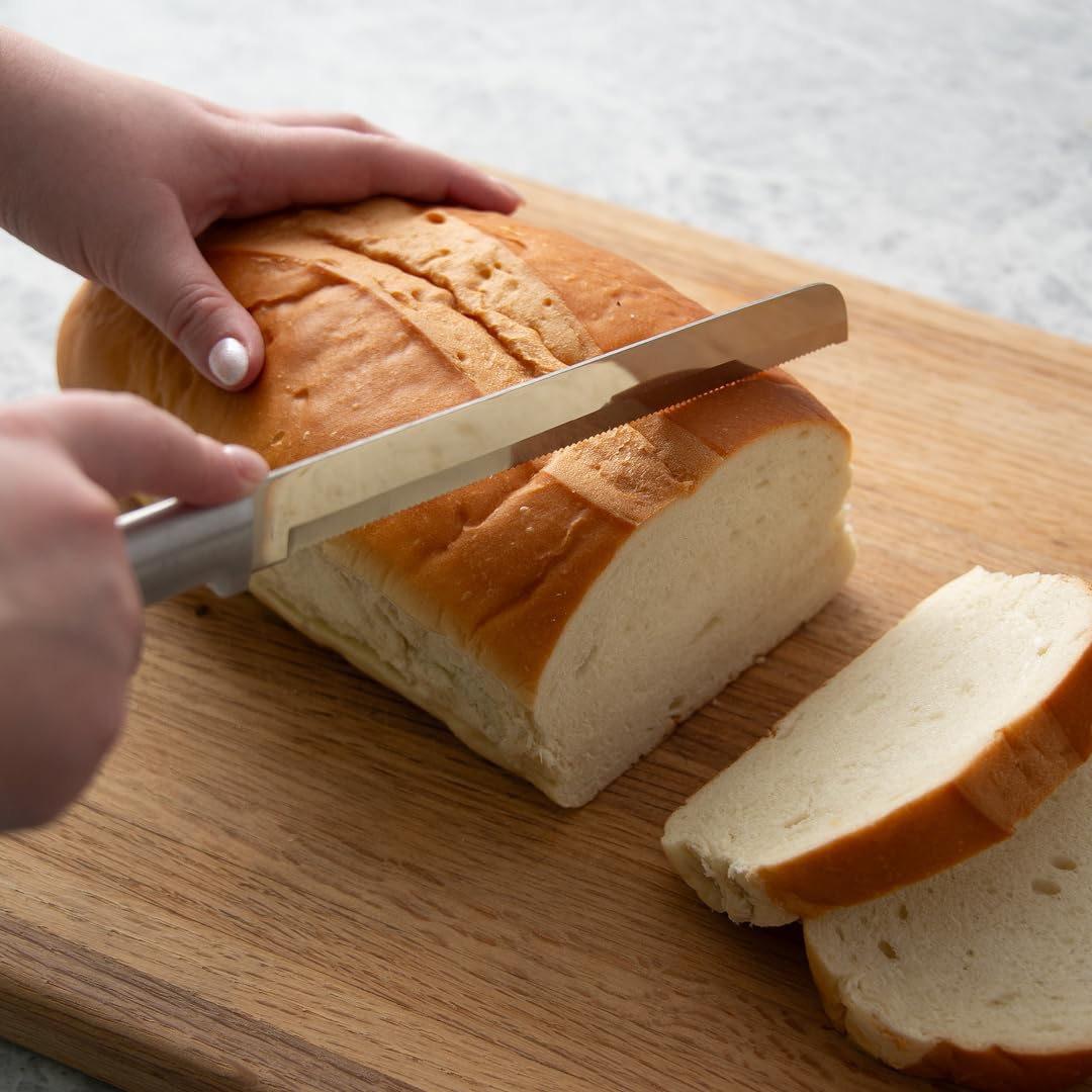 Bread knife slicing rye and multigrain loaves