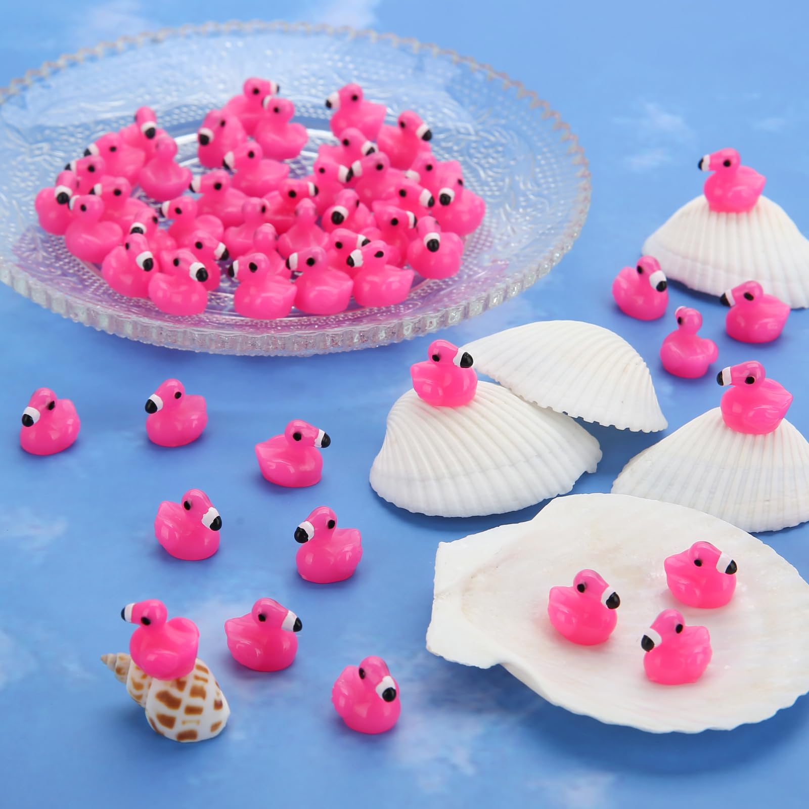 Small flamingo figures sized 0.55 by 0.47 inches