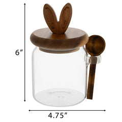 Clear glass jar with natural wood bunny lid and attached spoon