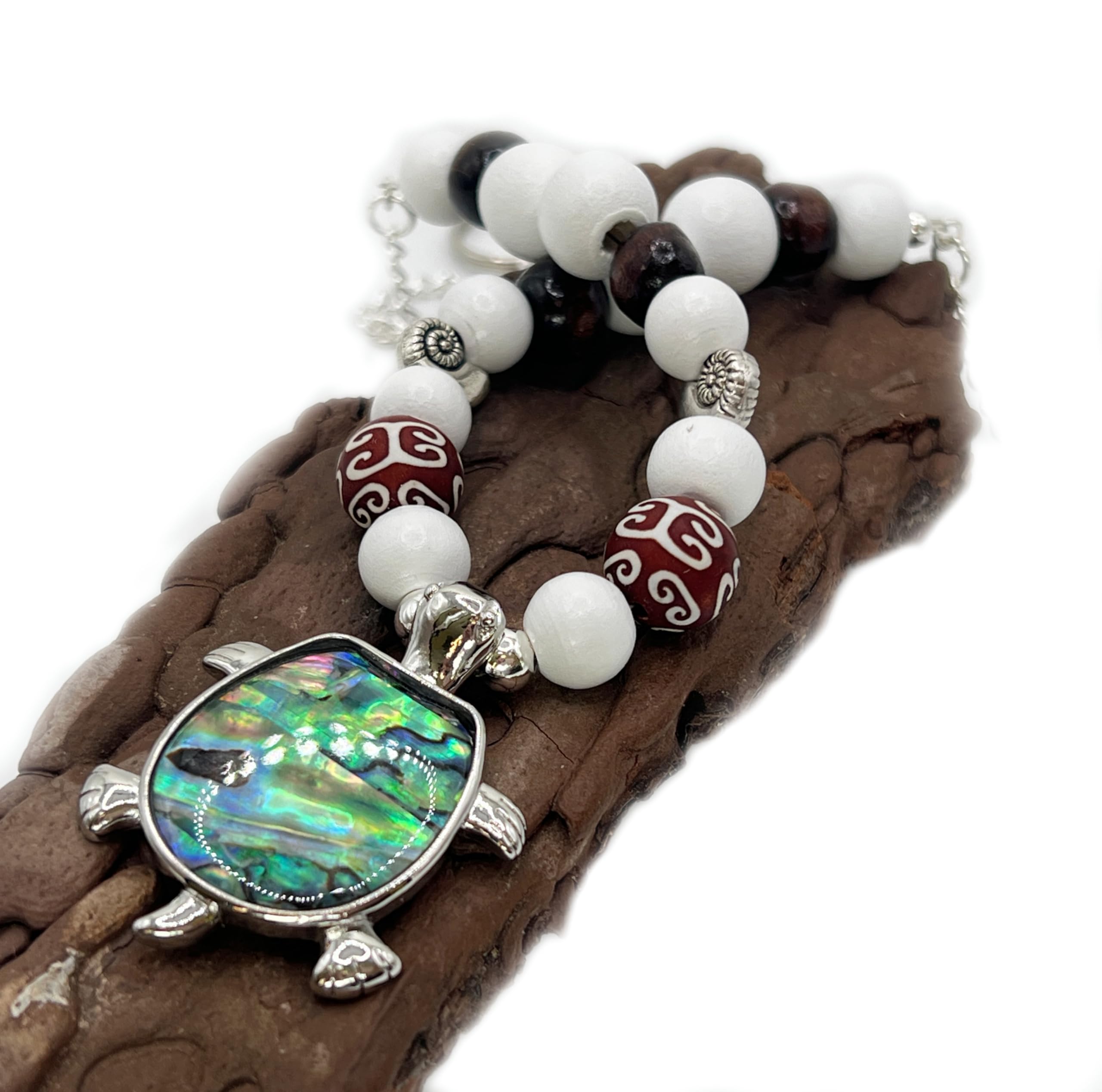 White wood beads with burgundy accent beads on each tieback
