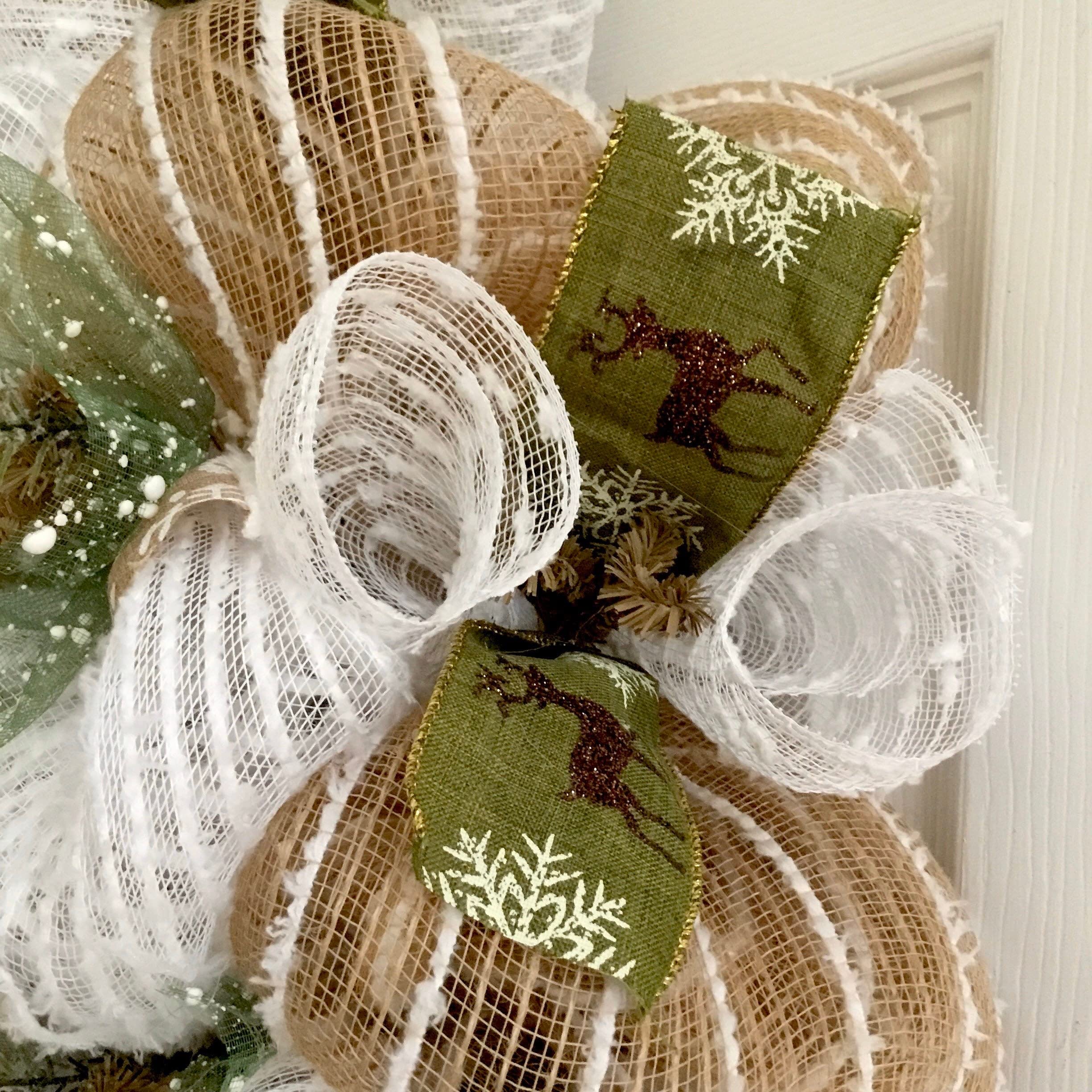 Burlap snowflake ribbon with green accents on wreath