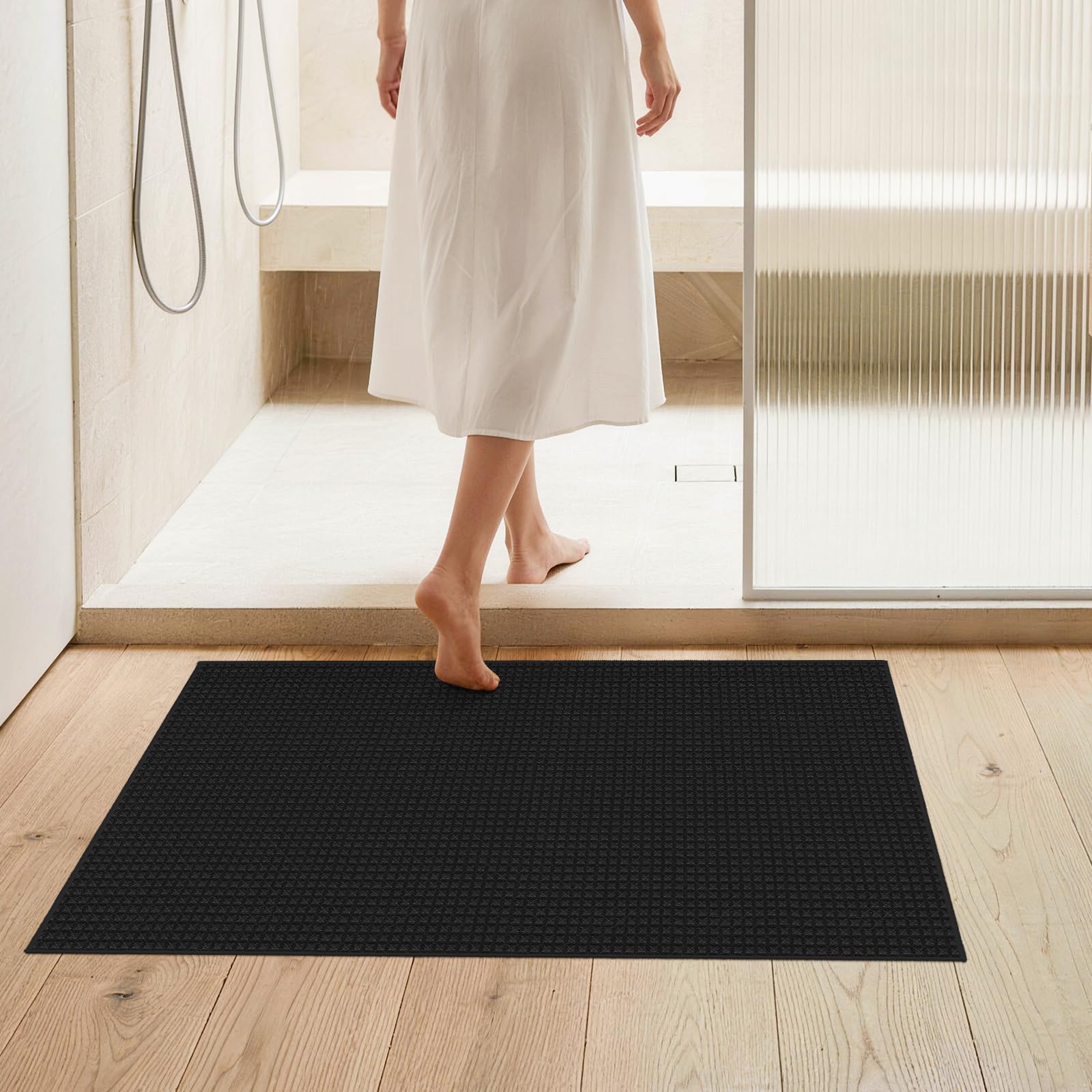Bathroom setting with BYYVOO 2x3 rug boho textured design in room