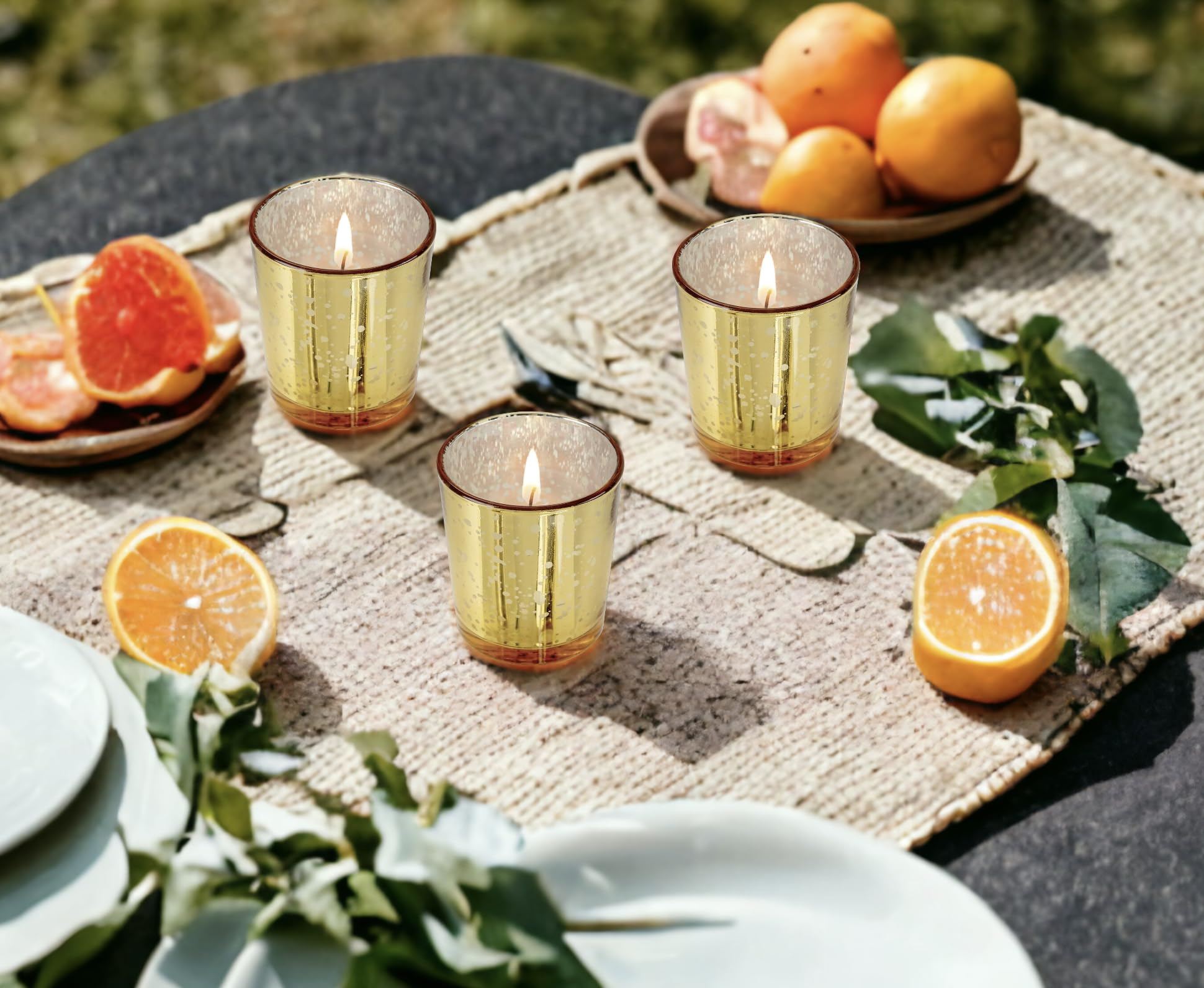 Citronella votives deterring mosquitoes for outdoor use