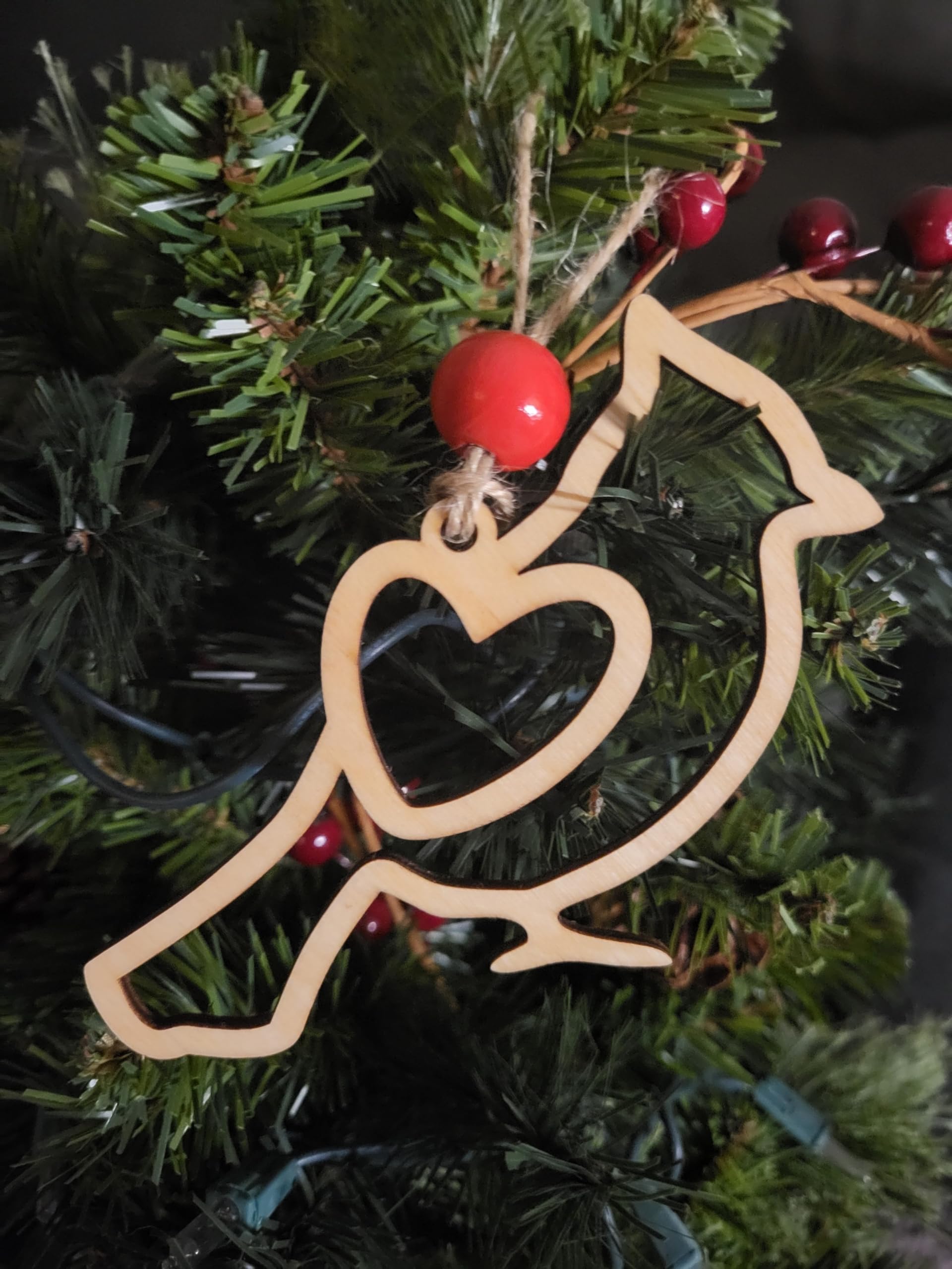 Wooden Christmas decoration with cardinal motif