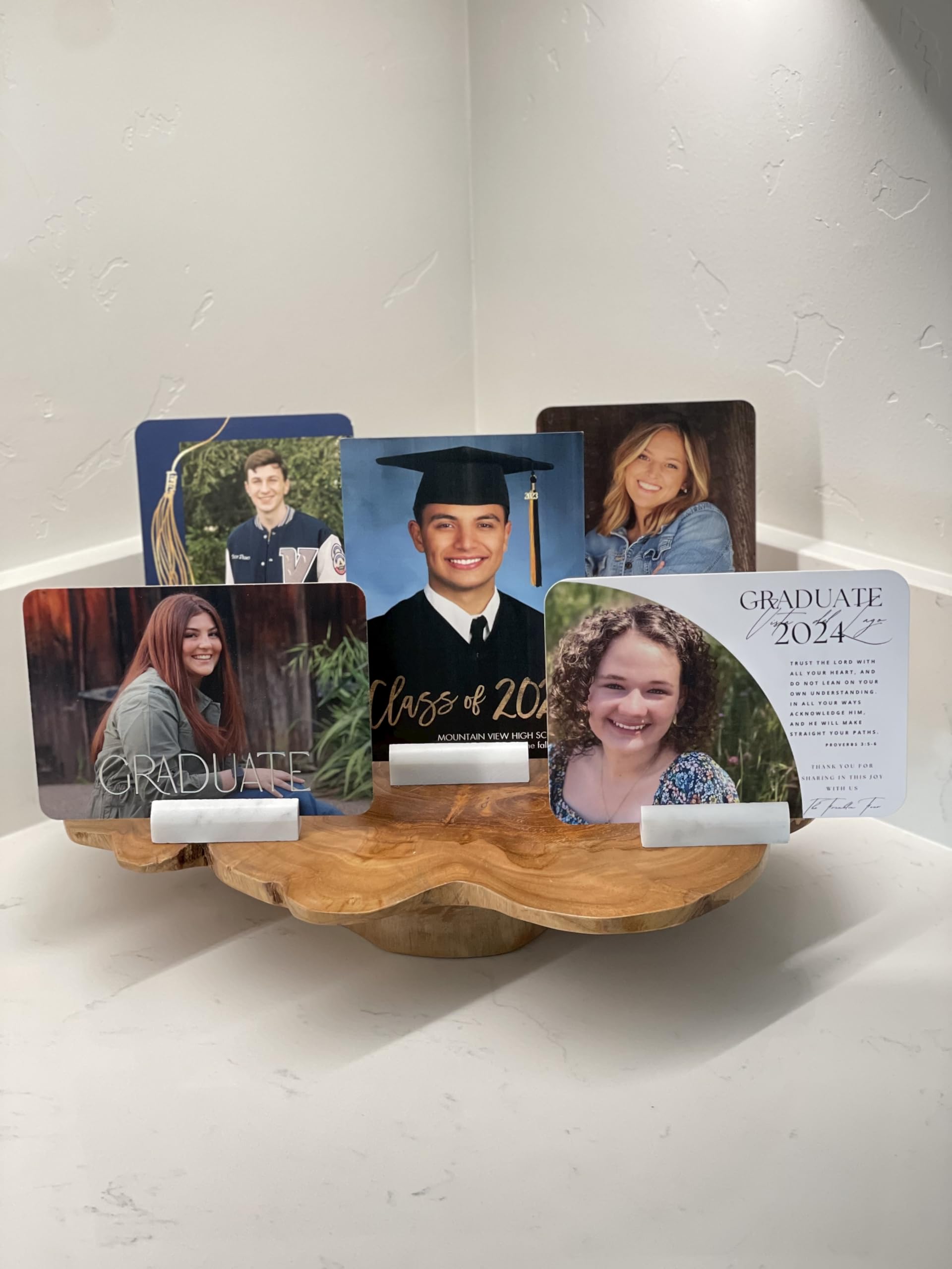 Carrara marble place card holders used as table number holders at a formal event