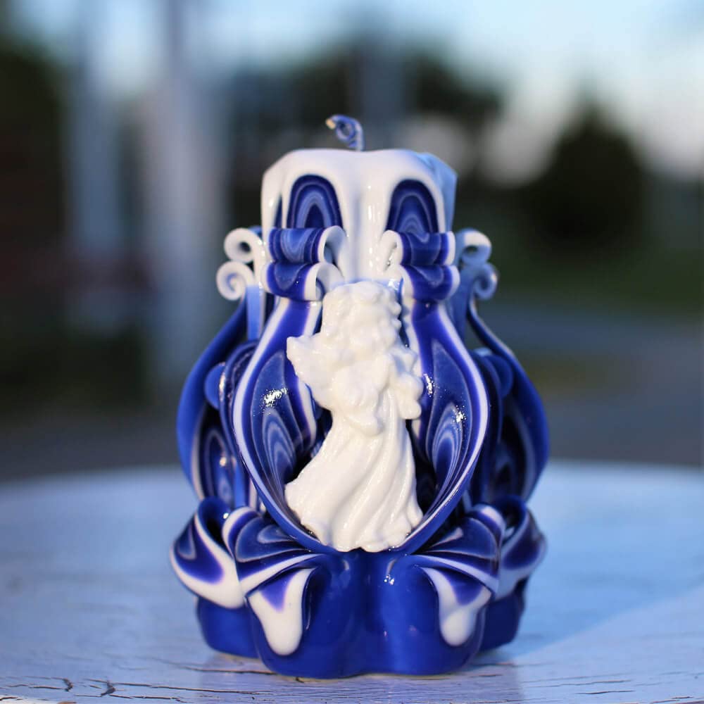 Blue carved candle with navy stripes and angel centerpiece handmade in Kiev