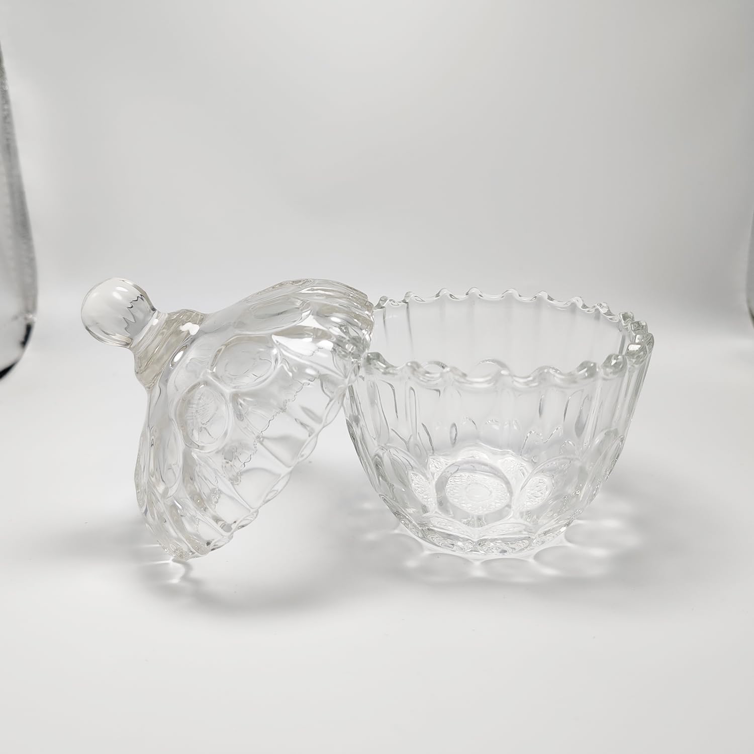 glass jar with carved lines base