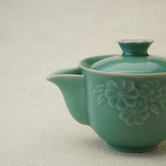 Longquan Celadon teapot with floral carvings