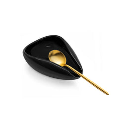 Ceramic coffee spoon rest in small black on kitchen counter