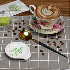 Ceramic shamrock spoon rest protecting stove top and counter