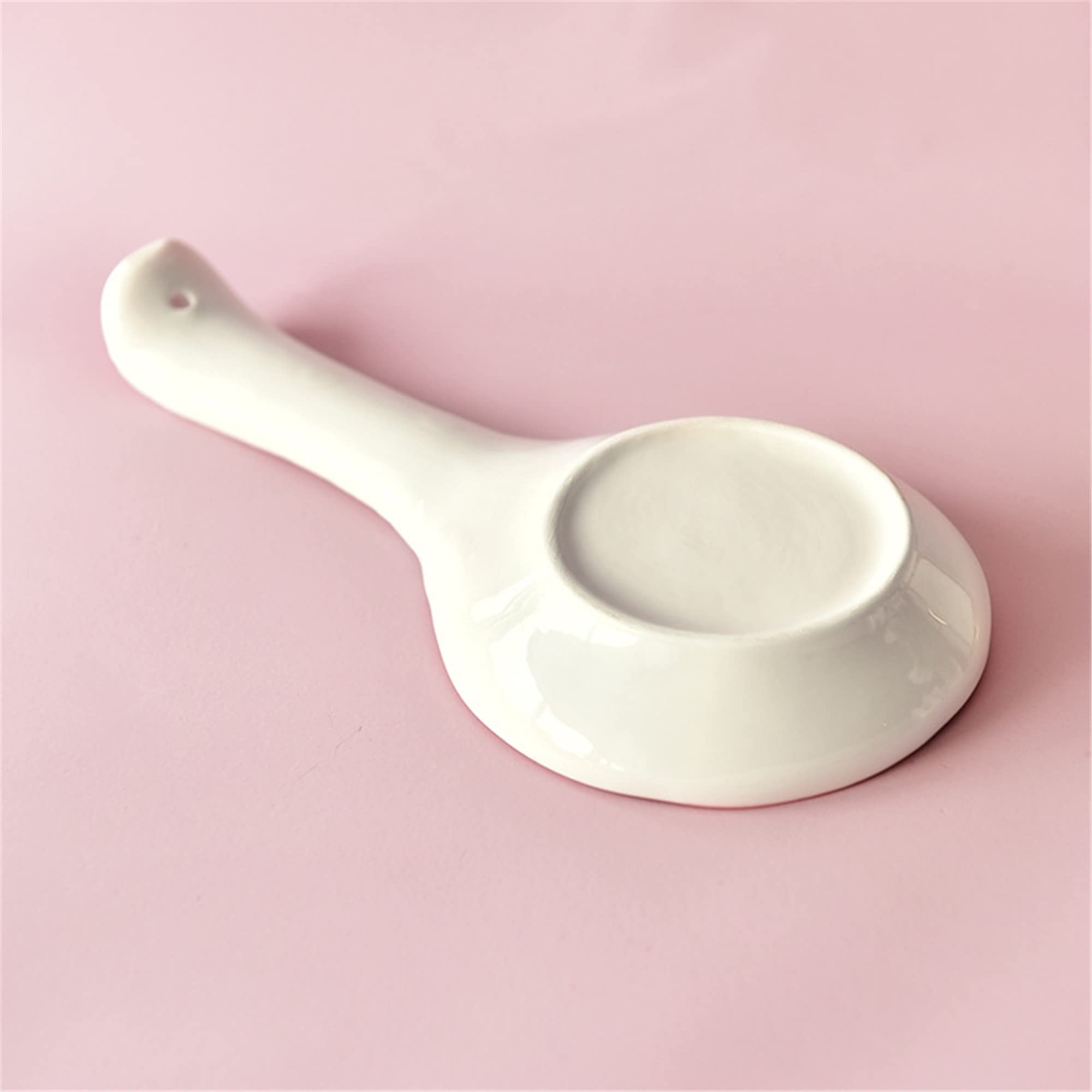 Dishwasher safe ceramic spoon rest with glossy glaze