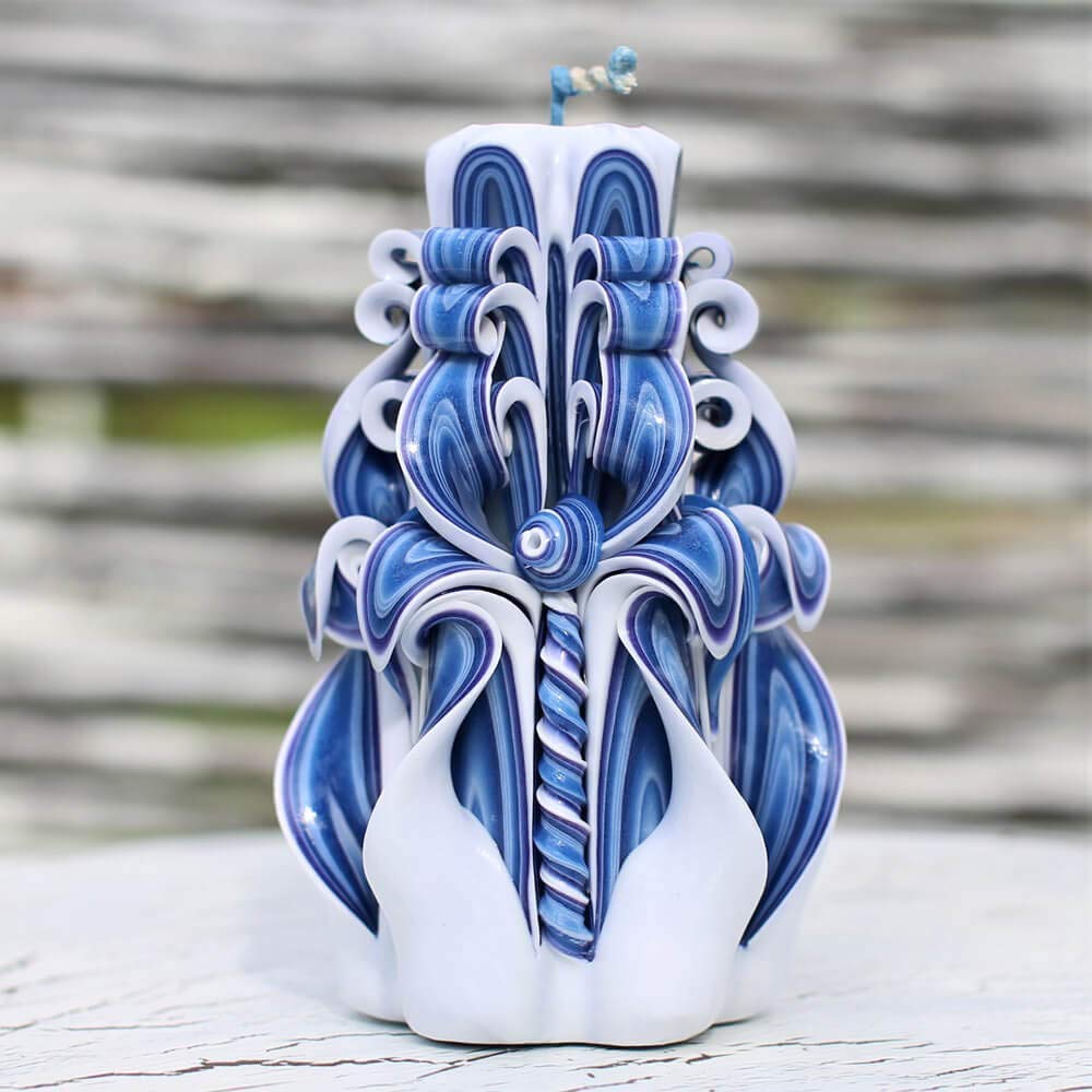 Product gallery image of navy blue carved candle