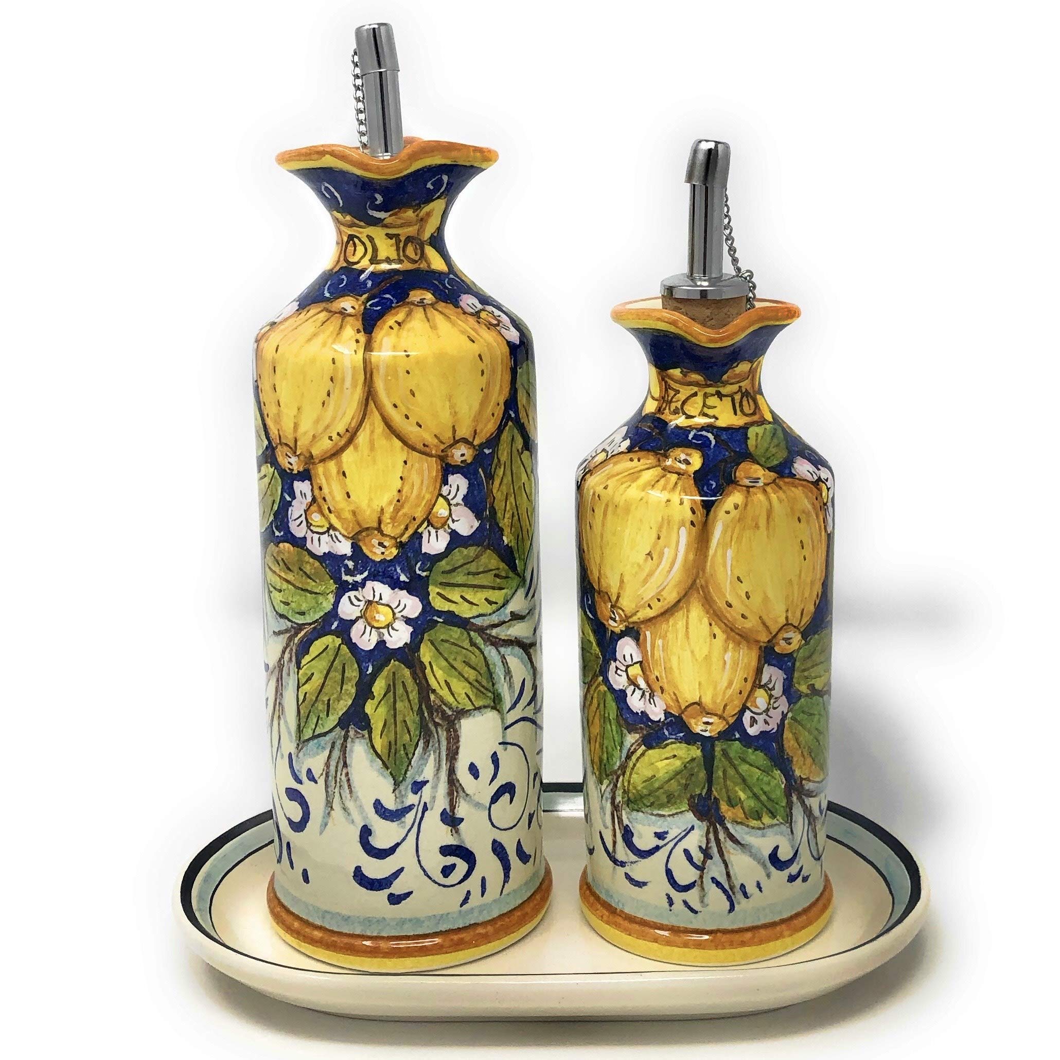 small tray included with oil and vinegar cruets