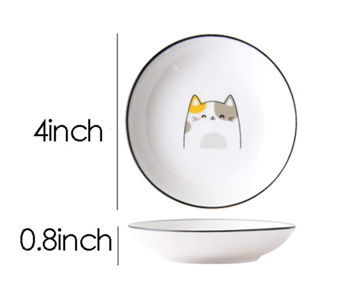 Close up of cat design on ceramic dipping plates