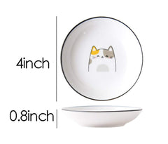 Close up of cat design on ceramic dipping plates