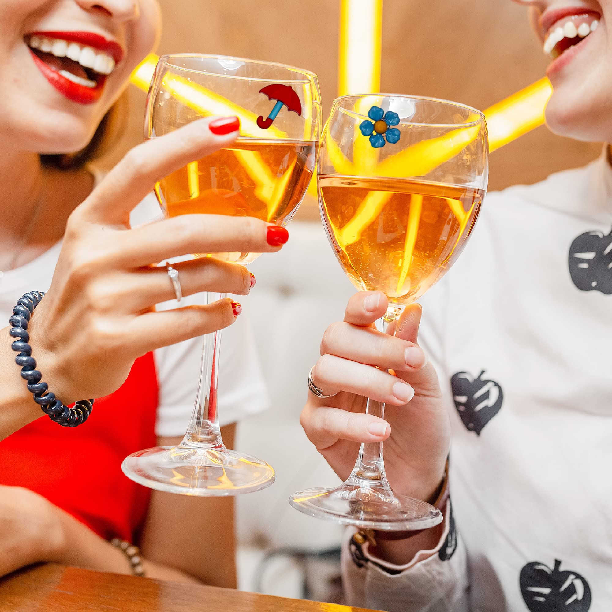 Champagne glass markers featuring ducks and flowers