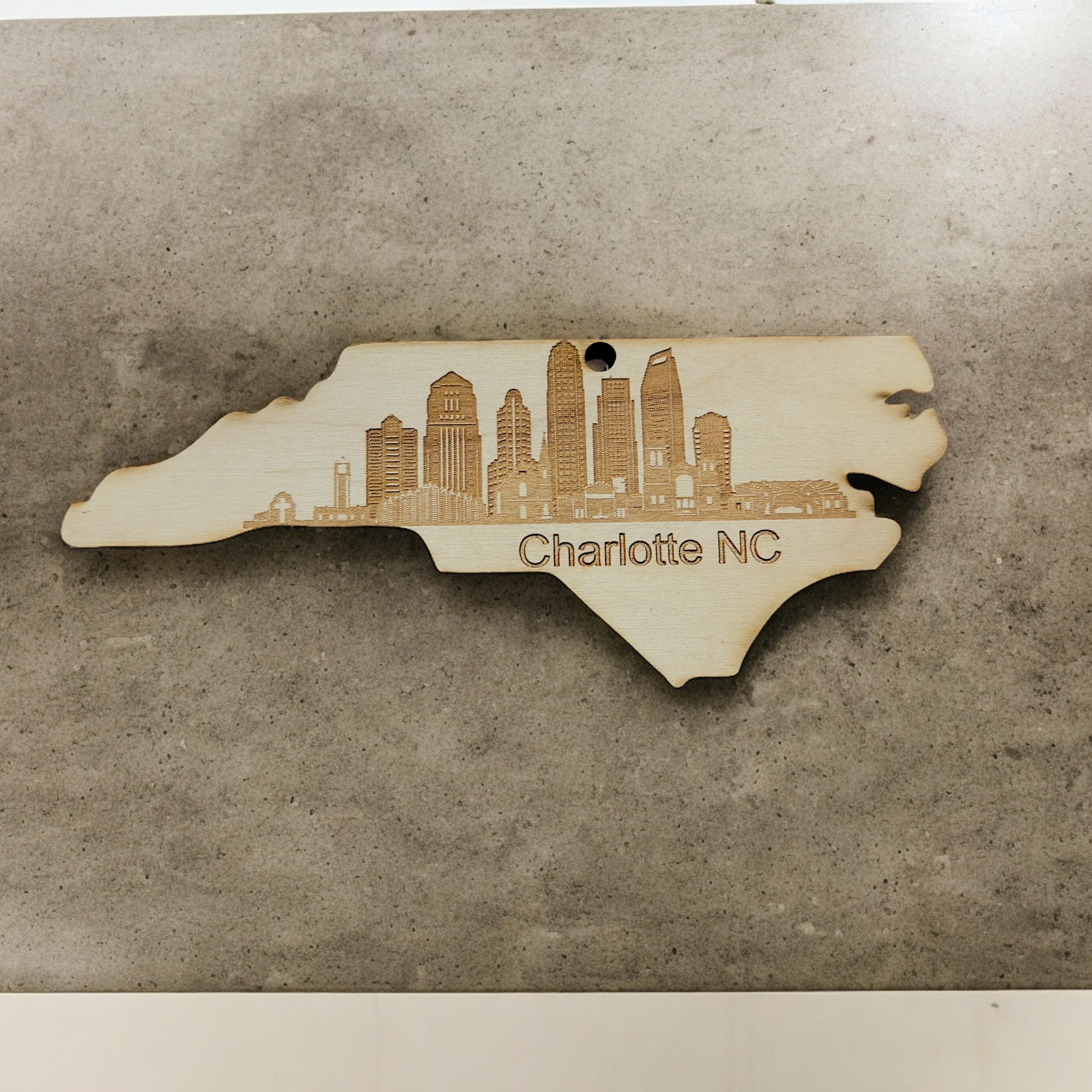 Charlotte NC Skyline maple ornament on wood