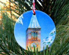 Round glazed ceramic double sided ornament with red and white twine hanging