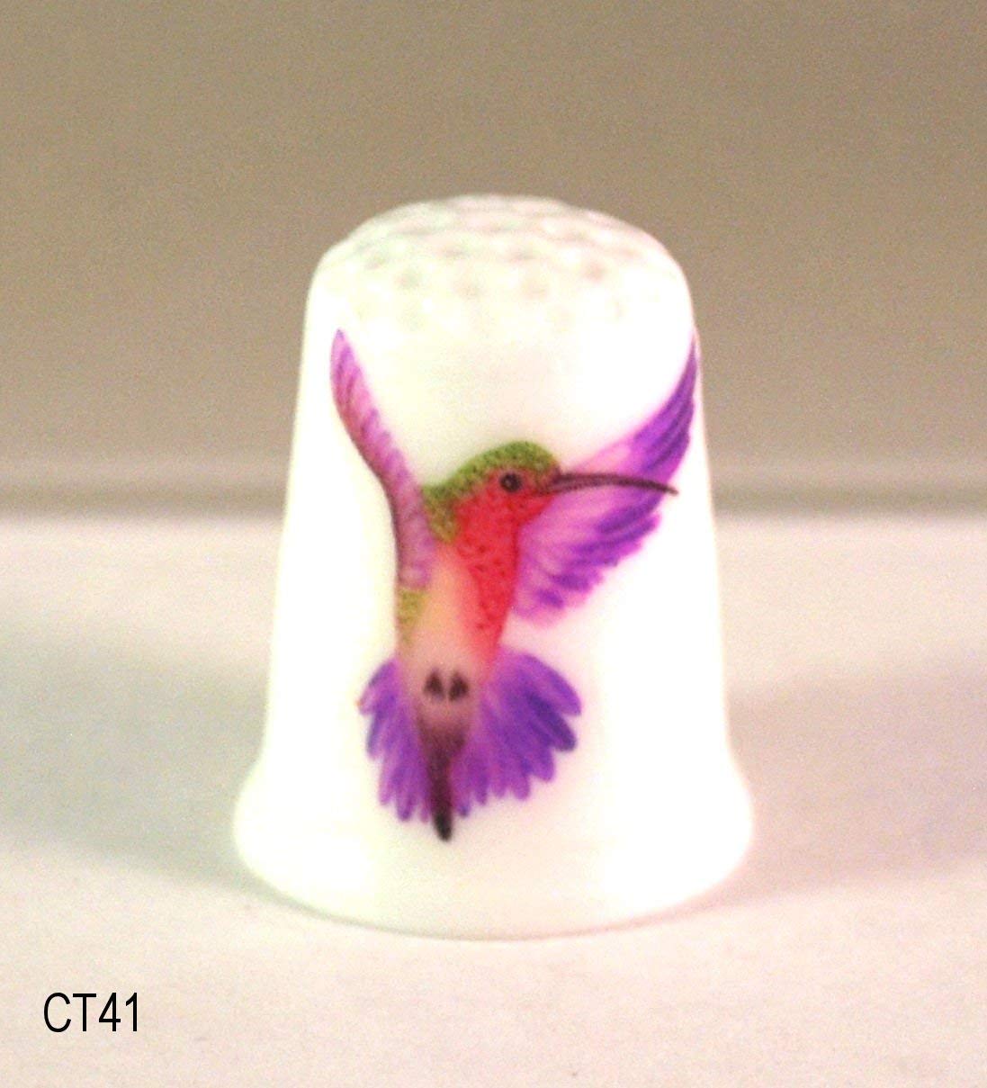 Decorative display thimble sculpture with colorful hummingbird artwork