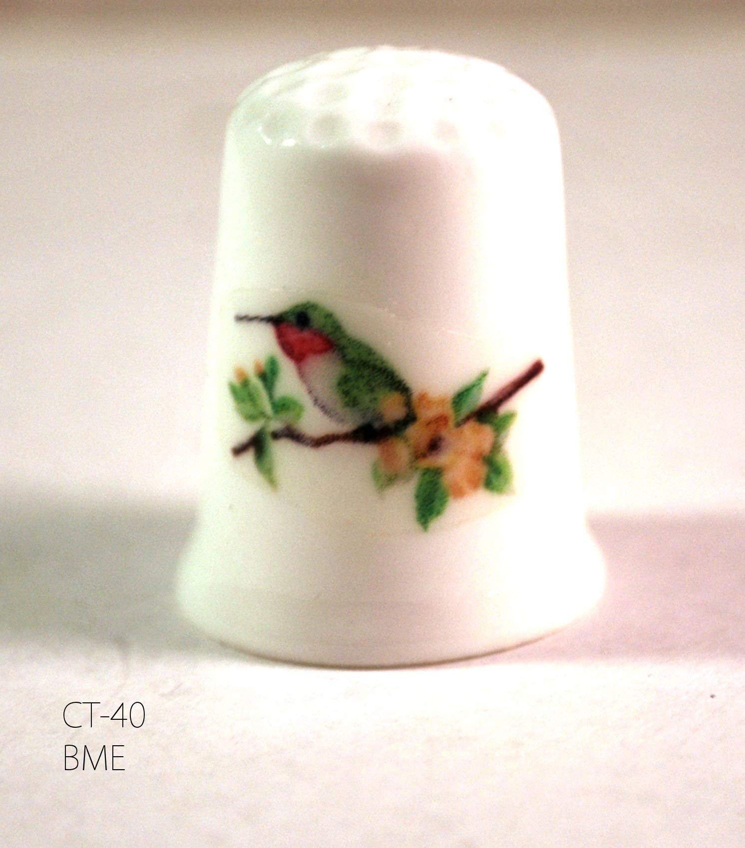 Watercolor hummingbird design on thimble sculpture