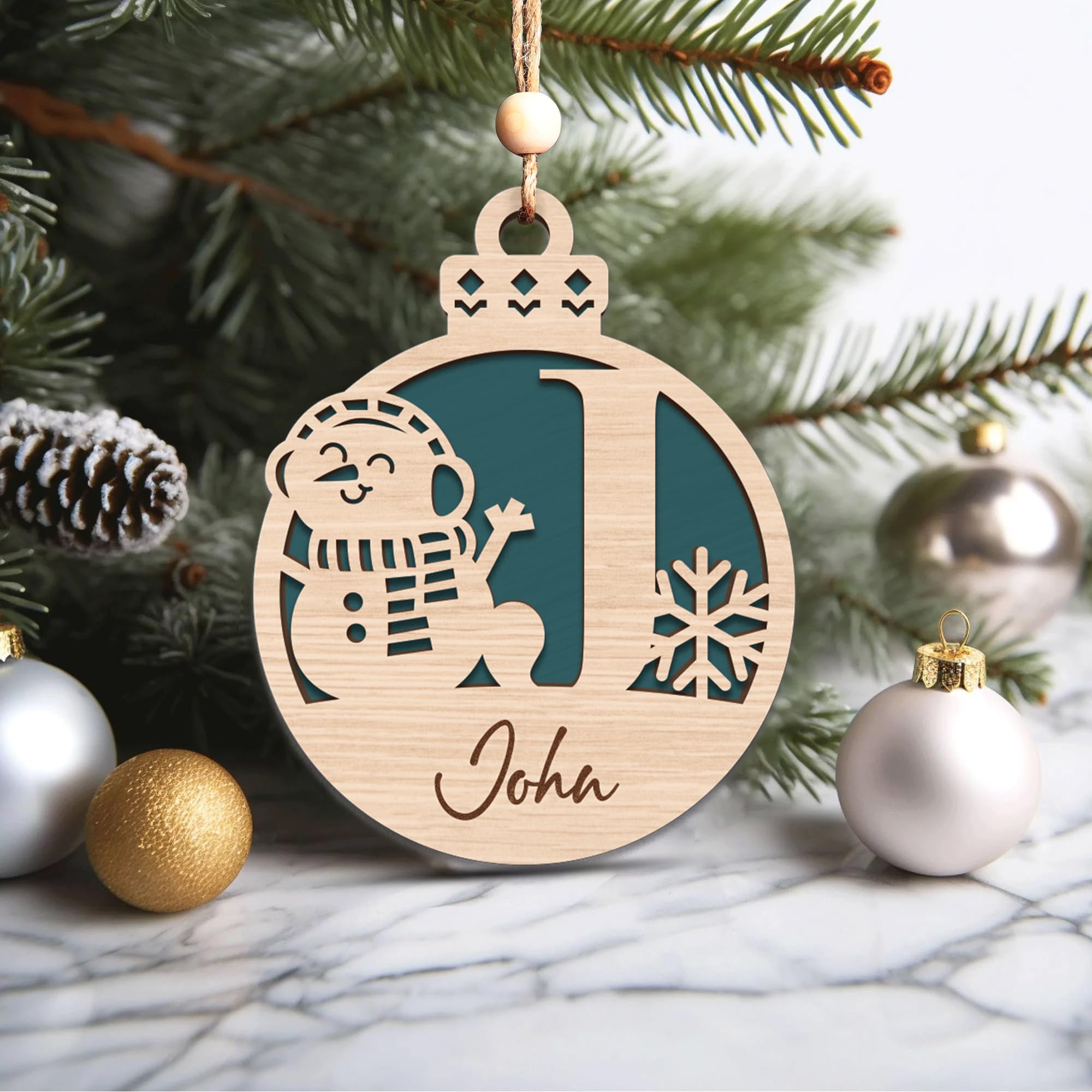 Festive decor snowman ornament with red ribbon