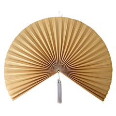 ChumDecor Fan Wall Decor unfolds to 40x40 inches with tassels