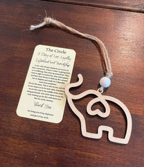 Maple wood ornament with white bead
