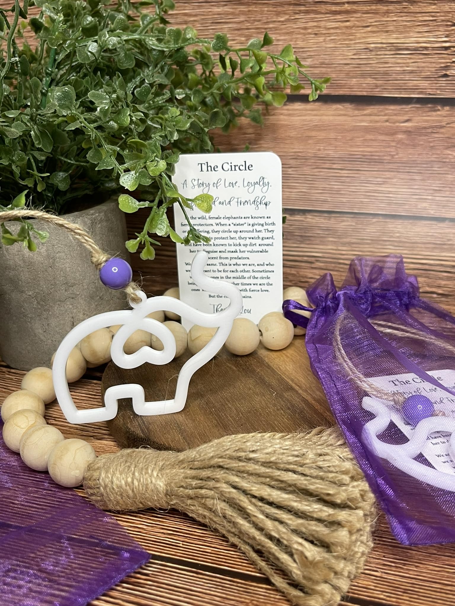 Purple bead accent on circle elephant ornament