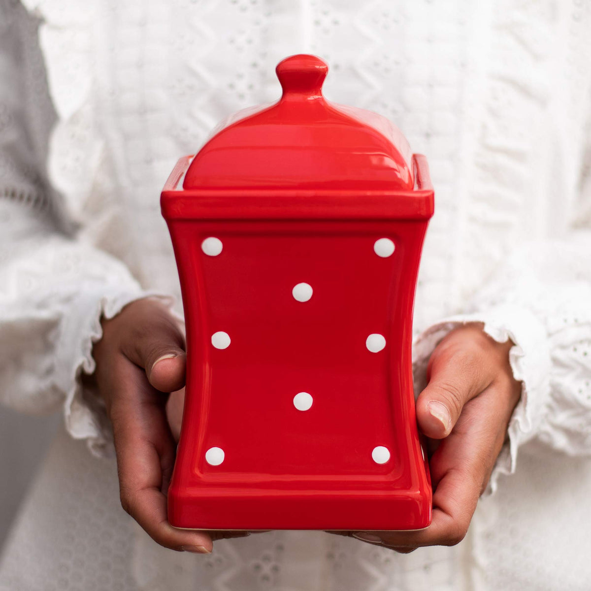 City to Cottage ceramic jar with red and white polka dot design