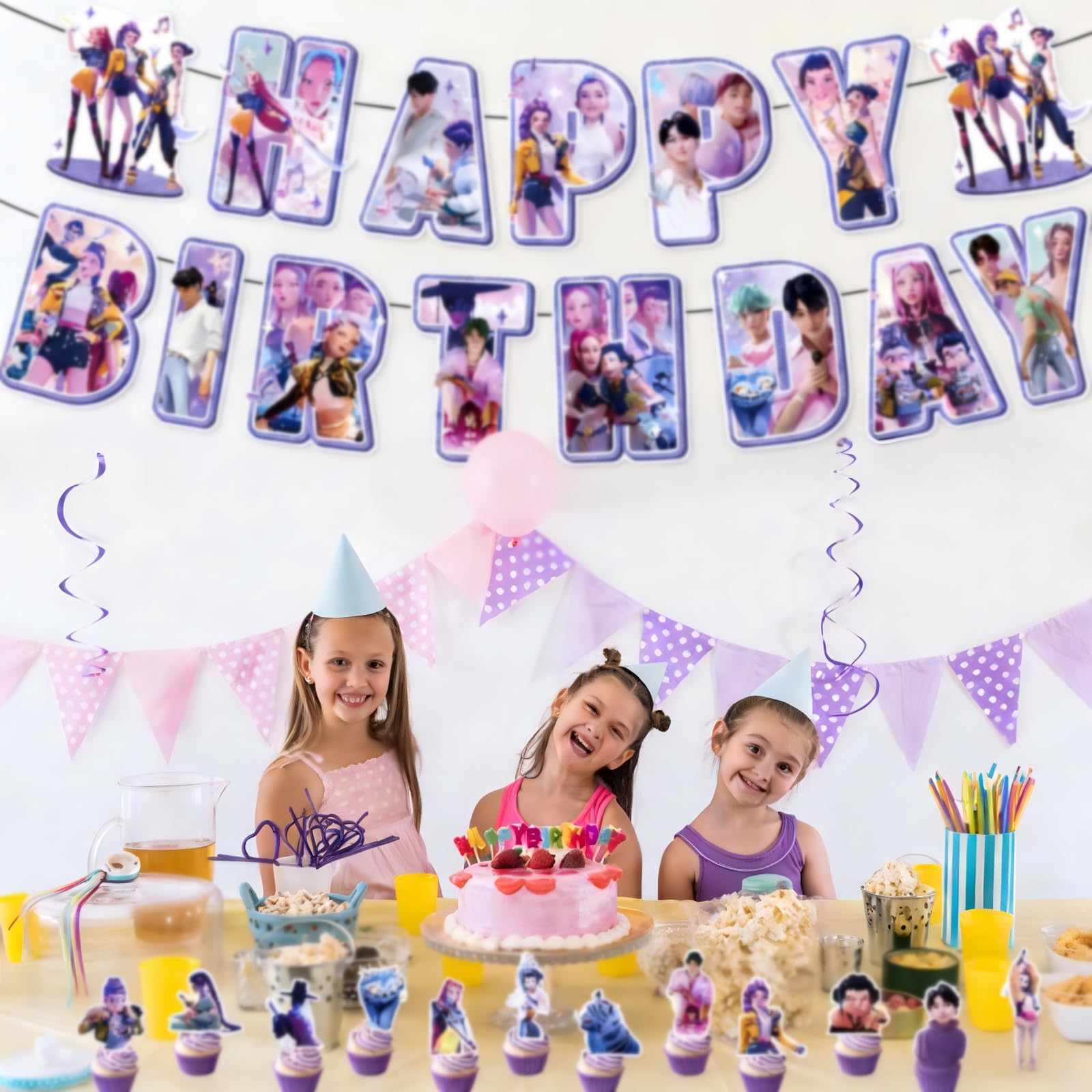 Cake toppers and background cloth as part of themed party kit
