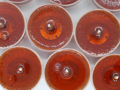 Cloves scented mineral oil tea lights 1.5in x 1in