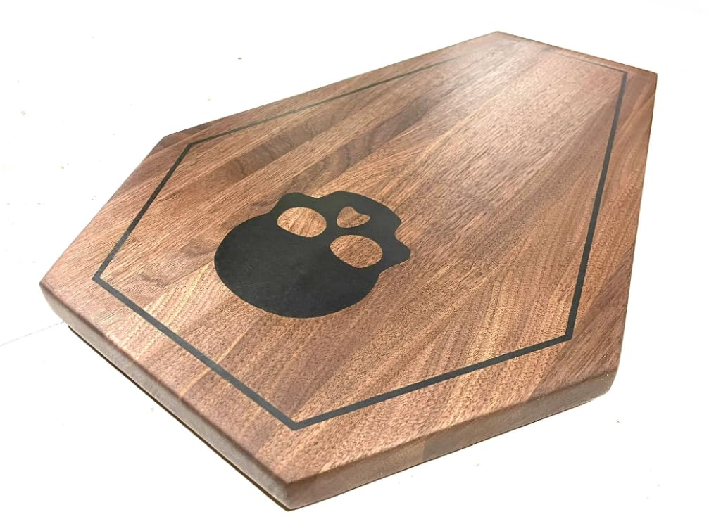 Coffin shaped charcuterie board with skull resin fill in solid walnut