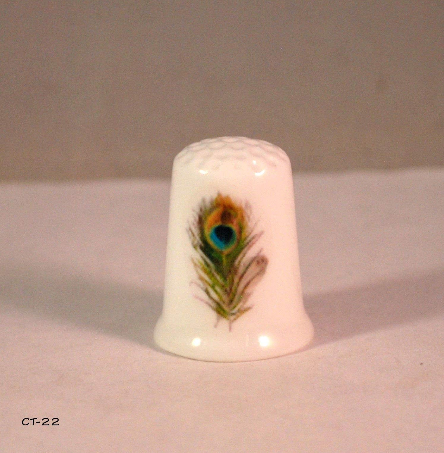 China thimble base decorated with peacock decal