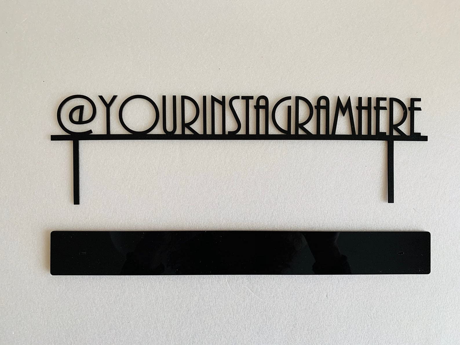 Black color metal hashtag sign on table