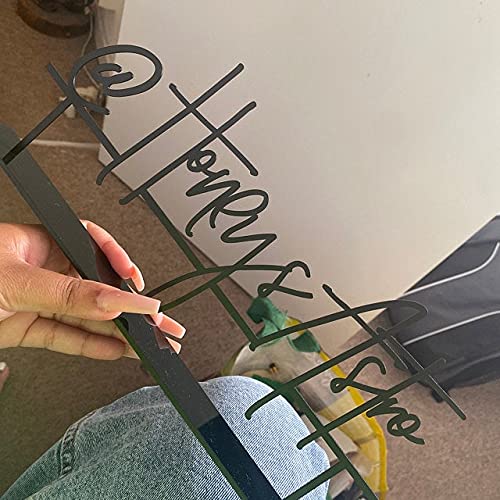 Gold color metal hashtag sign on table