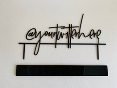 Red color metal hashtag sign on table