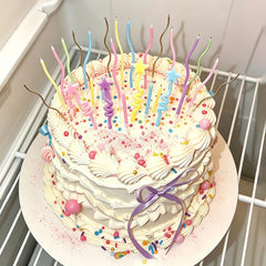 Colorful twisty candles for cake decoration