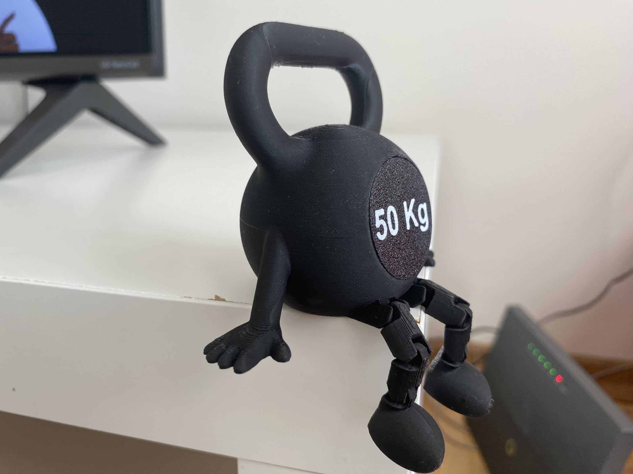Compact kettlebell desk decor on display size 2.7 x 3 x 3 in