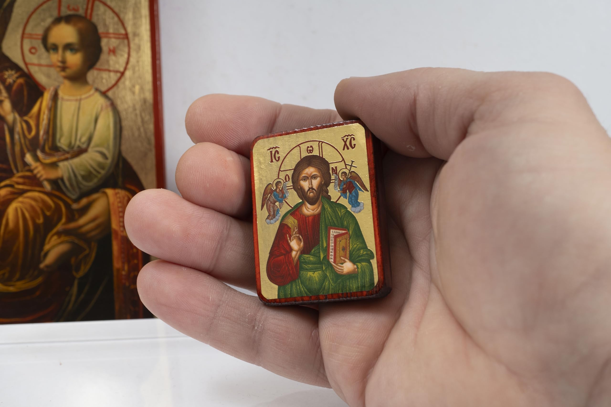 Portable handmade icon designed to fit wallet or bag