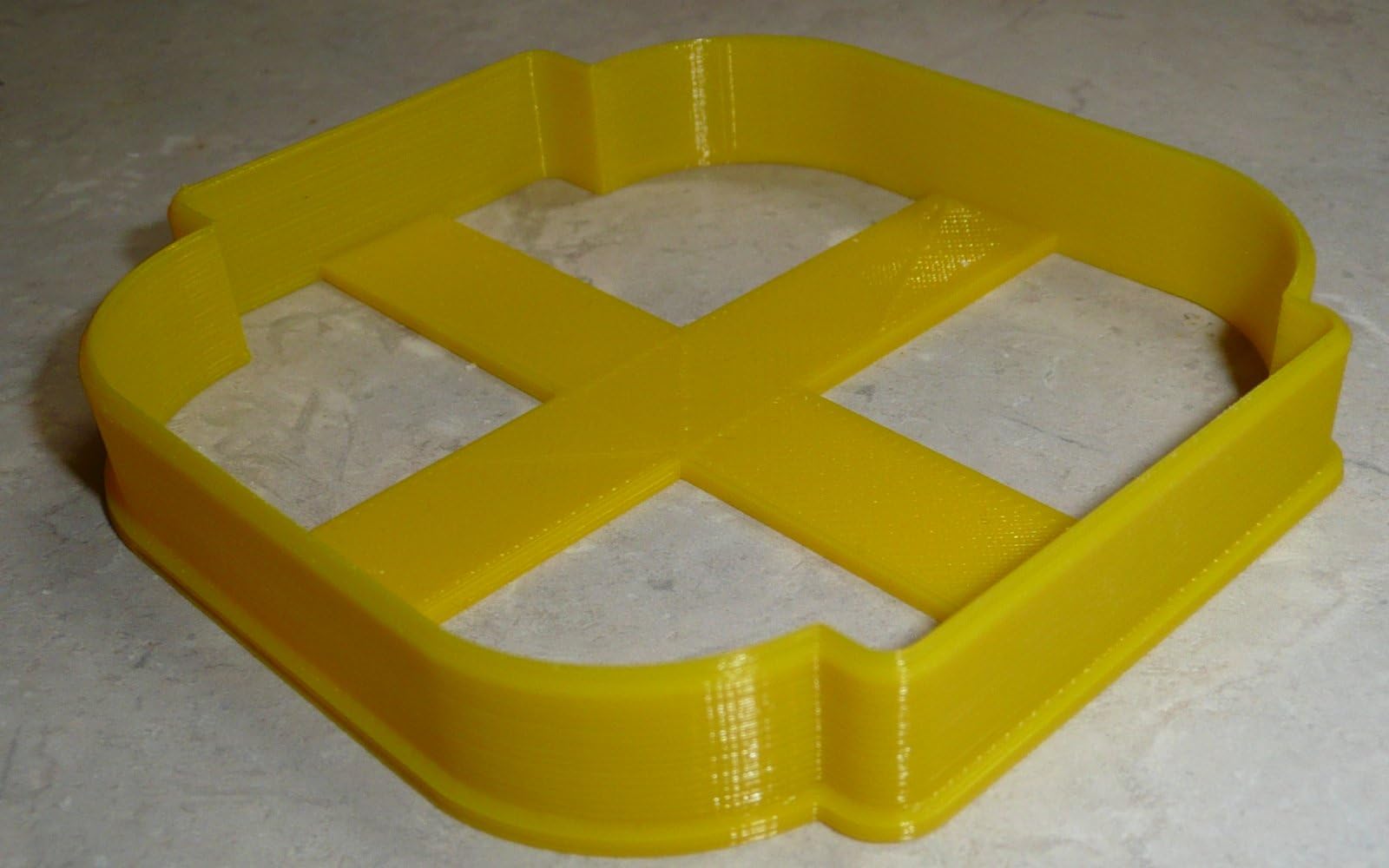Size 3 1/4 x 3 3/4 x 5/8 inch cookie cutter