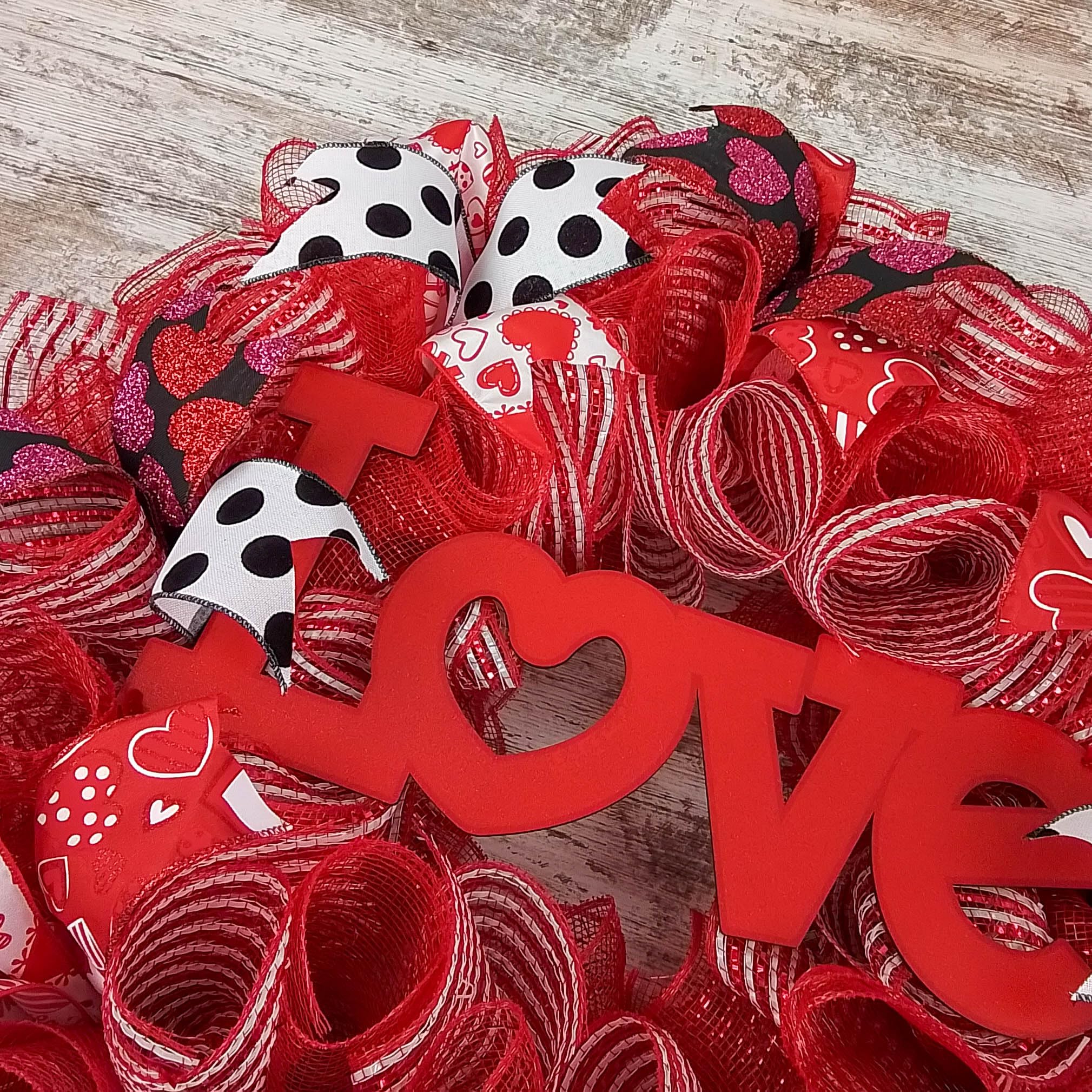 Size 24 inch round and 5 inch deep Valentines wreath