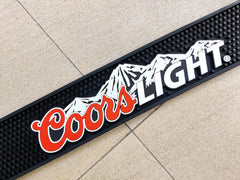 bar mat showing black non stick rubber and branding
