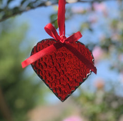 Decorative copper foil edges on red heart suncatcher