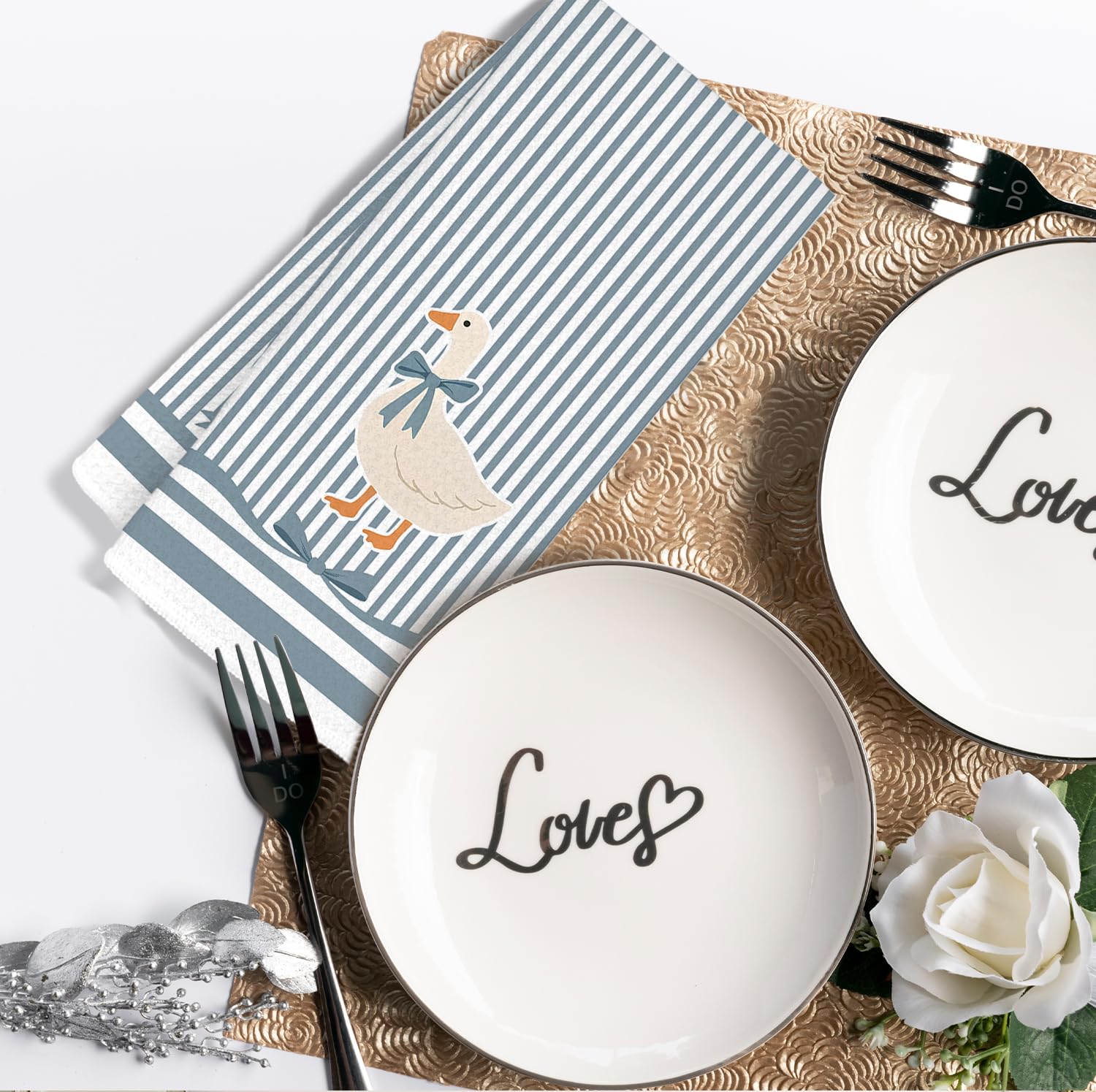 Towels displayed on rack suitable for kitchen or bathroom use