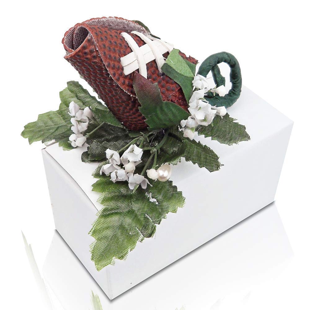 Artificial greenery and baby's breath with boutonniere