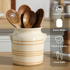 Heavy utensils held securely in ceramic crock